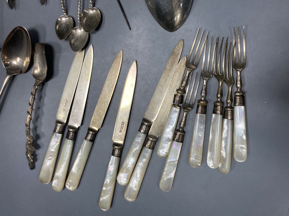Six pairs of George V mother of pearl handled silver fruit eaters, Sheffield, 1933, etc.